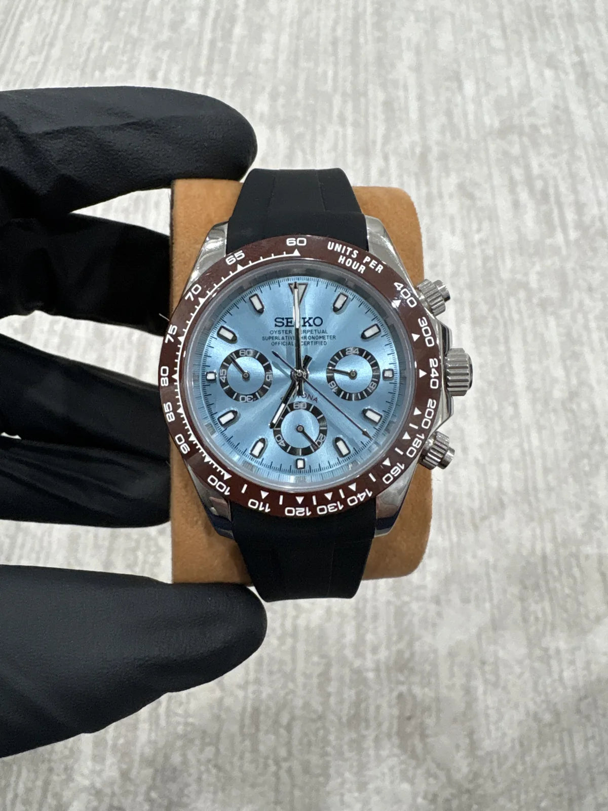 Close view of a blue dial watch