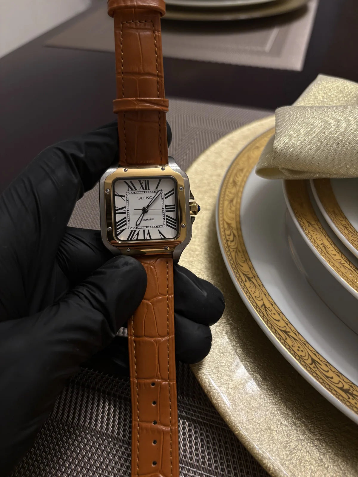 A watch photographed in a quiet editorial setting